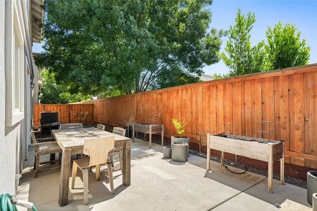 27 Bentwater Loop, Chico, CA 95973 - fenced backyard with outdoor dining area and a patio
