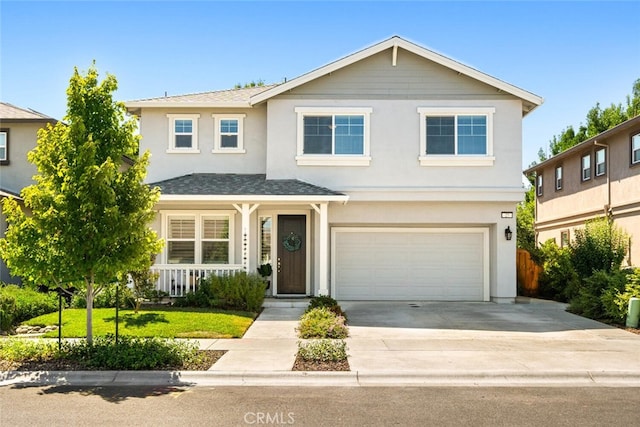 27 Bentwater Loop, Chico, CA 95973 - traditional-style home with a garage, stucco siding, concrete driveway, a porch, and roof with shingles