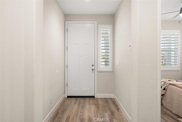 27 Bentwater Loop, Chico, CA 95973 - doorway with wood finished floors and a ceiling fan