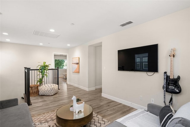 27 Bentwater Loop, Chico, CA 95973 - living room featuring light wood-style flooring and recessed lighting
