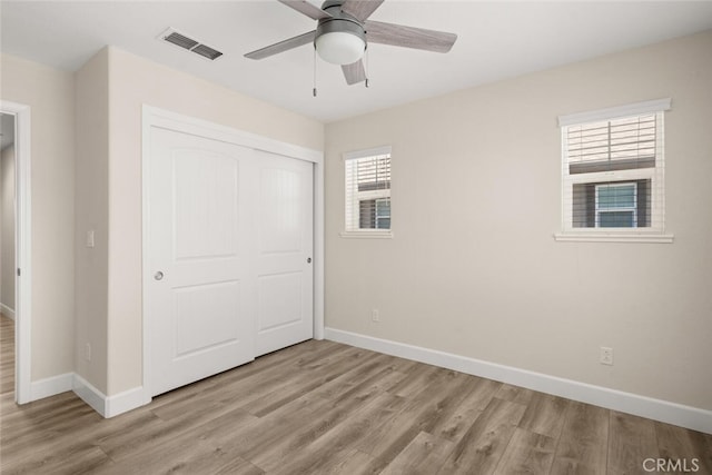 27 Bentwater Loop, Chico, CA 95973 - unfurnished bedroom with light wood finished floors, a closet, and ceiling fan