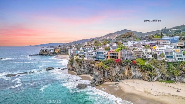31895 Circle Dr, Laguna Beach, CA 92651 - water view featuring local beach and a mountain backdrop