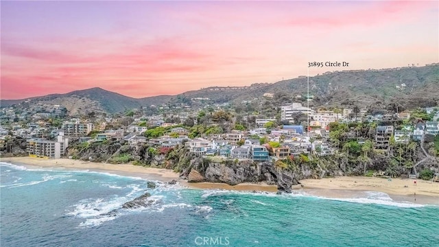 31895 Circle Dr, Laguna Beach, CA 92651 - pool at dusk with a water and mountain view