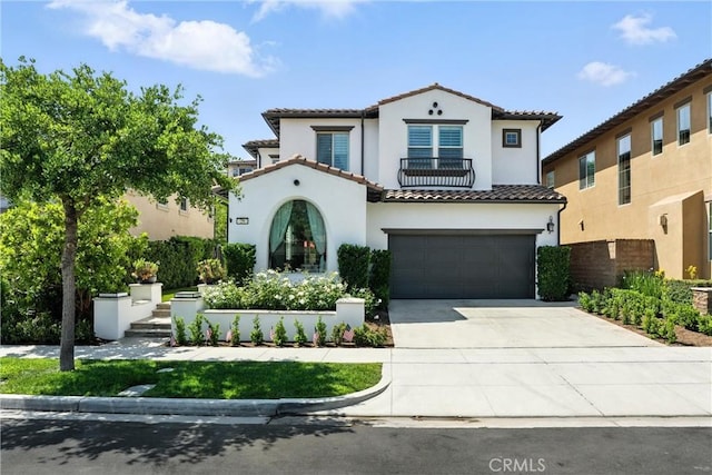 29 Lucido St, Rancho Mission Viejo, CA 92694 - mediterranean / spanish-style house featuring a tile roof, driveway, stucco siding, and an attached garage