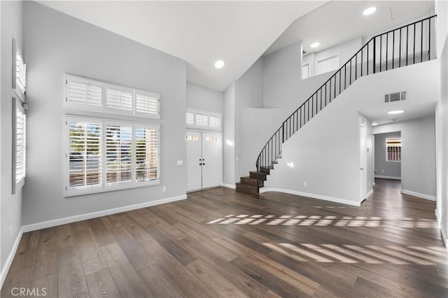 2892 Chuckwagon Rd, Palmdale, CA 93550 - foyer entrance with a high ceiling, stairway, hardwood / wood-style flooring, and recessed lighting