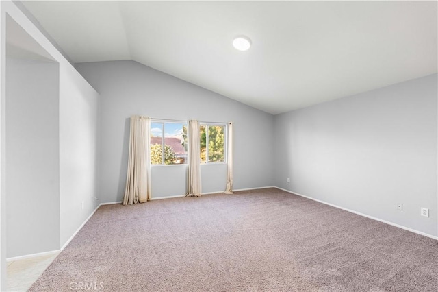 2892 Chuckwagon Rd, Palmdale, CA 93550 - spare room featuring light colored carpet and vaulted ceiling