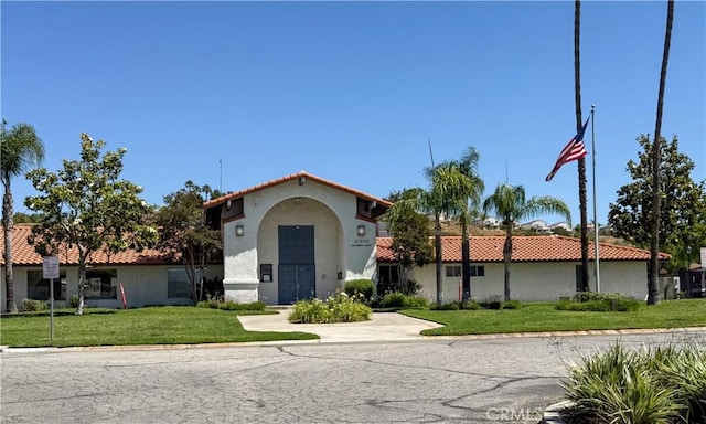 27545 Jasper Way, Castaic, CA 91384 - mediterranean / spanish-style home with a front yard, stucco siding, and a tile roof