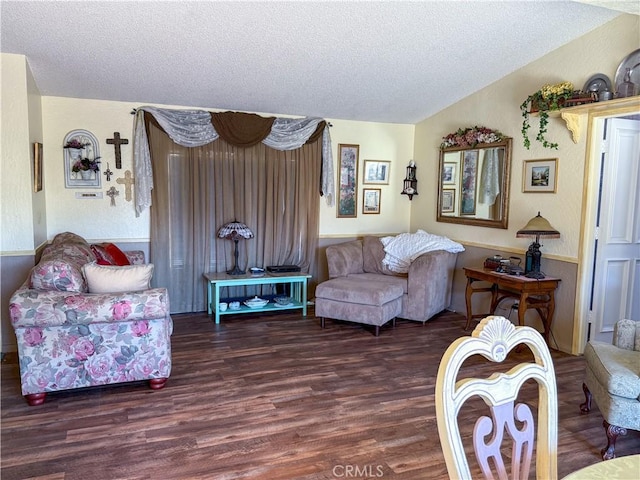 27545 Jasper Way, Castaic, CA 91384 - living area featuring wood finished floors, lofted ceiling, and a textured ceiling