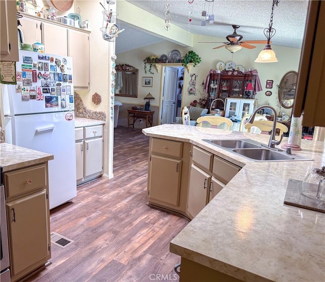27545 Jasper Way, Castaic, CA 91384 - kitchen featuring freestanding refrigerator, lofted ceiling, light countertops, a ceiling fan, and light wood-style floors