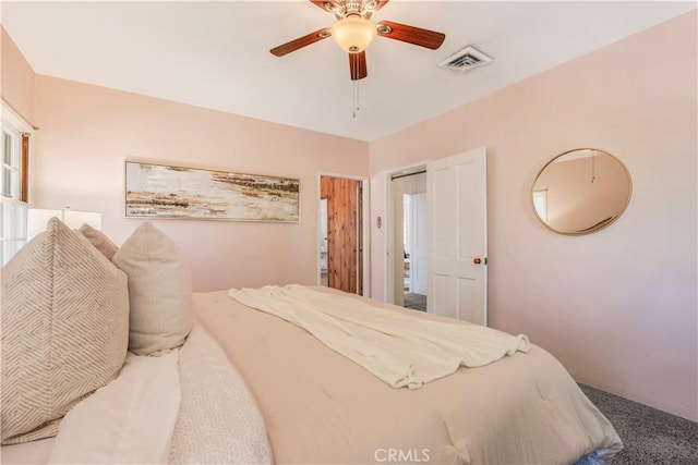 695 W 13th St, Upland, CA 91786 - carpeted bedroom featuring a ceiling fan