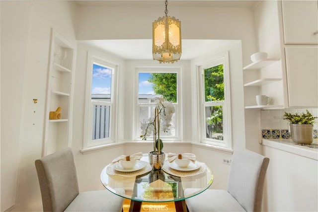 695 W 13th St, Upland, CA 91786 - dining room with a chandelier