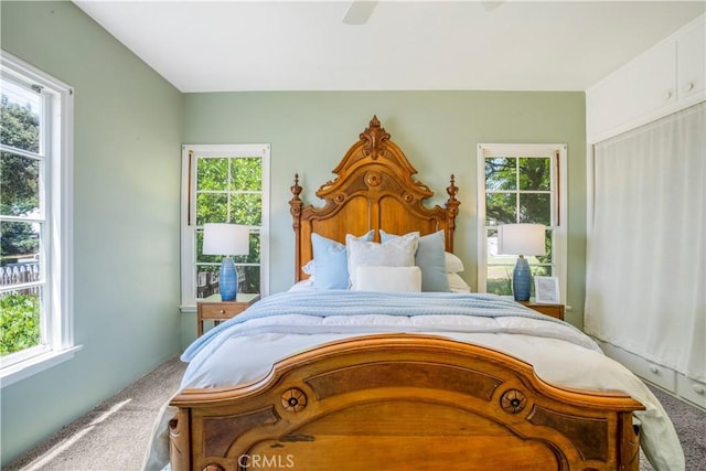 695 W 13th St, Upland, CA 91786 - carpeted bedroom featuring multiple windows and ceiling fan