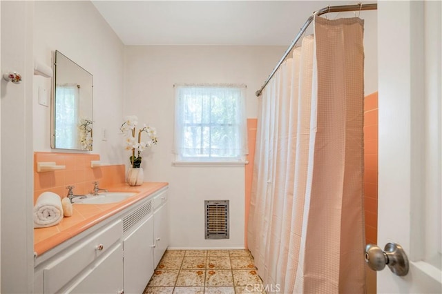 695 W 13th St, Upland, CA 91786 - bathroom with vanity and a shower with curtain