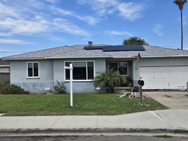 835 Corvina St, Imperial Beach, CA 91932 - ranch-style house with stucco siding, a shingled roof, an attached garage, roof mounted solar panels, and a front lawn