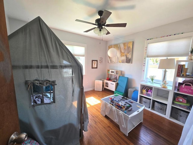 835 Corvina St, Imperial Beach, CA 91932 - living area with healthy amount of natural light, wood finished floors, and ceiling fan