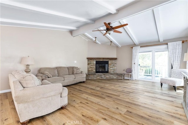 4955 Arizona Ave, Atascadero, CA 93422 - living area featuring light wood finished floors, a ceiling fan, and a fireplace