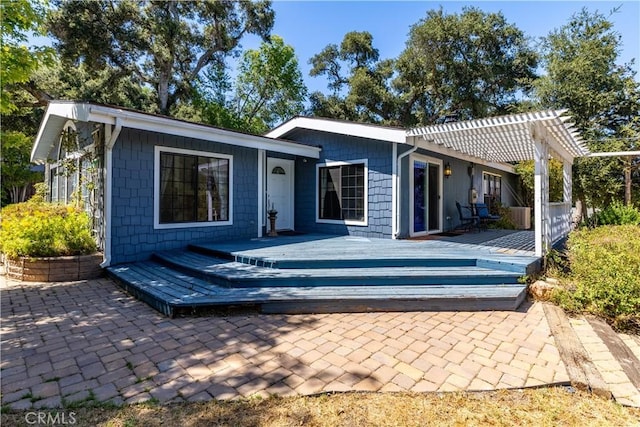 4955 Arizona Ave, Atascadero, CA 93422 - back of property featuring a pergola, a wooden deck, and a patio area