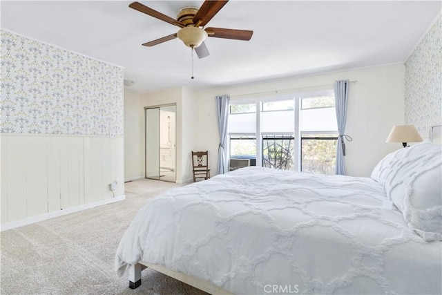 4955 Arizona Ave, Atascadero, CA 93422 - bedroom with wallpapered walls, wainscoting, carpet, ceiling fan, and crown molding
