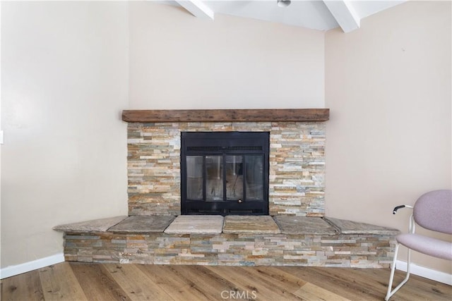 4955 Arizona Ave, Atascadero, CA 93422 - detailed view of beam ceiling, wood finished floors, and a glass covered fireplace