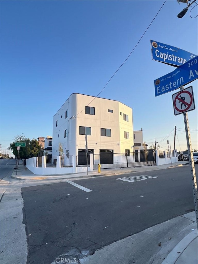 4268 Capistrano Way E, Los Angeles, CA 90063 - view of asphalt street with sidewalks, curbs, and traffic signs