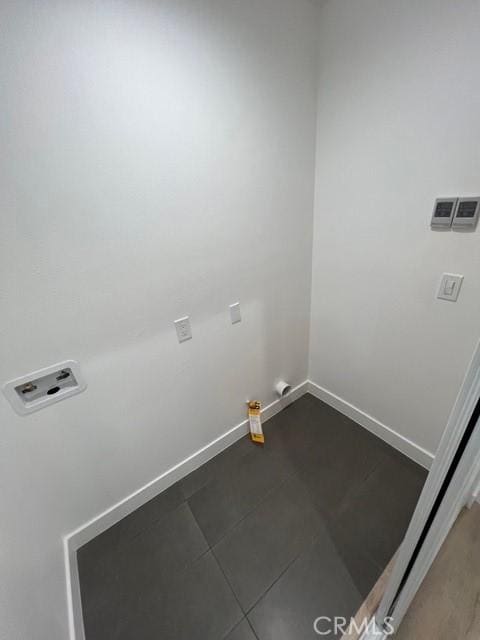 1217 E 22nd St, Los Angeles, CA 90011 - laundry area featuring hookup for a washing machine and baseboards