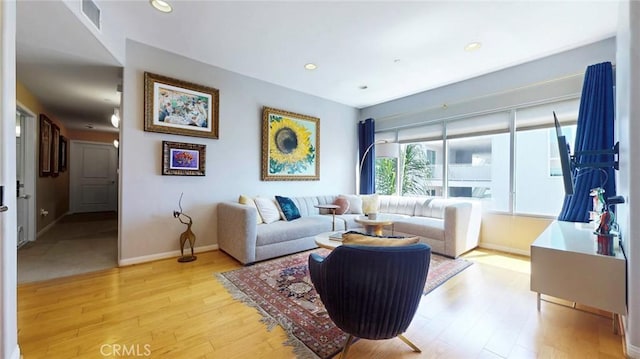 4821 Bakman Ave Unit 405, North Hollywood, CA 91601 - living area featuring light wood-style flooring and recessed lighting