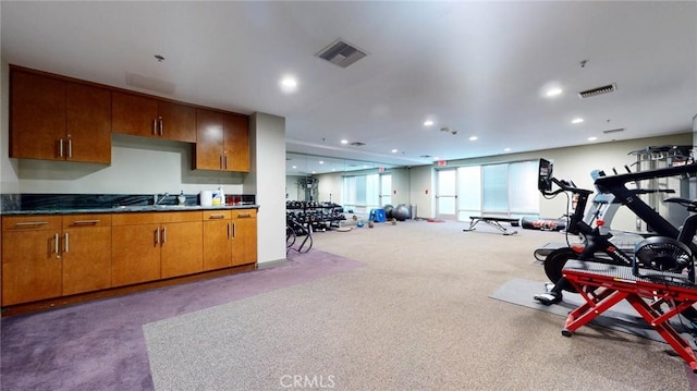 4821 Bakman Ave Unit 405, North Hollywood, CA 91601 - exercise room with carpet floors and recessed lighting