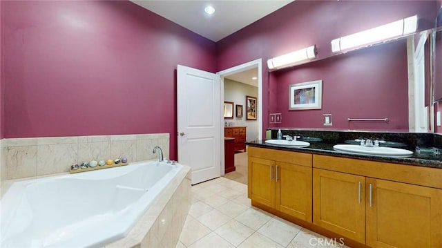 4821 Bakman Ave Unit 405, North Hollywood, CA 91601 - bathroom with double vanity, a bath, and tile patterned flooring