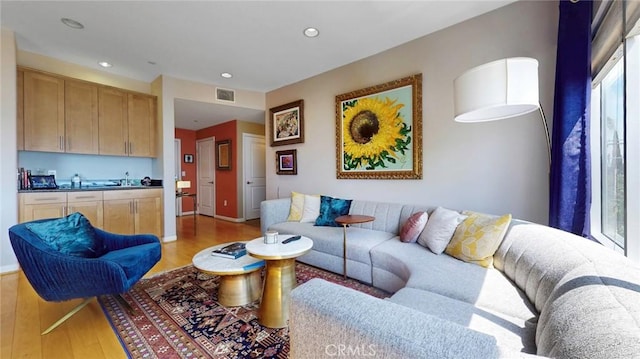 4821 Bakman Ave Unit 405, North Hollywood, CA 91601 - living area featuring light wood finished floors and recessed lighting