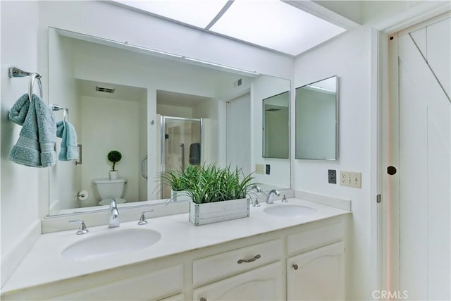 3463 Bahia Blanca W Unit B, Laguna Woods, CA 92637 - bathroom featuring double vanity and a stall shower