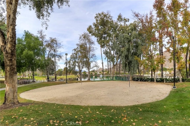 24538 Meadow Grass Way, Moreno Valley, CA 92557 - view of home's community featuring a lawn, volleyball court, and a water view