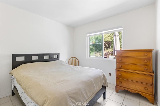 24538 Meadow Grass Way, Moreno Valley, CA 92557 - bedroom with light tile patterned floors and baseboards