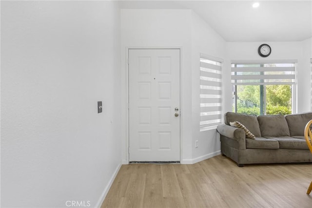24538 Meadow Grass Way, Moreno Valley, CA 92557 - living area with light wood-style flooring and recessed lighting
