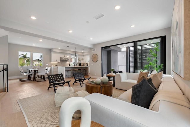 3586 Garfield St, Carlsbad, CA 92008 - living room with recessed lighting and light wood-style floors