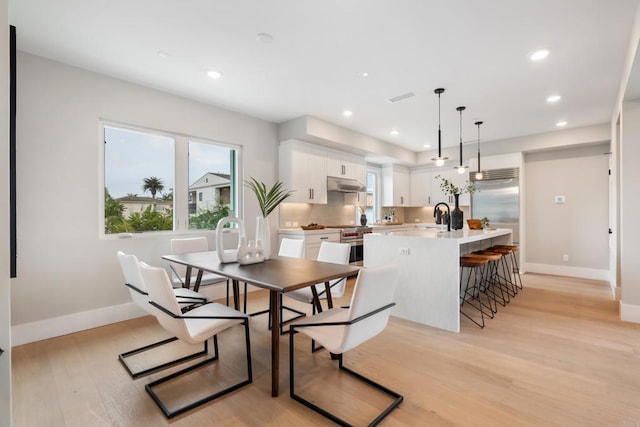 3586 Garfield St, Carlsbad, CA 92008 - dining area with healthy amount of natural light, light wood-style floors, and recessed lighting