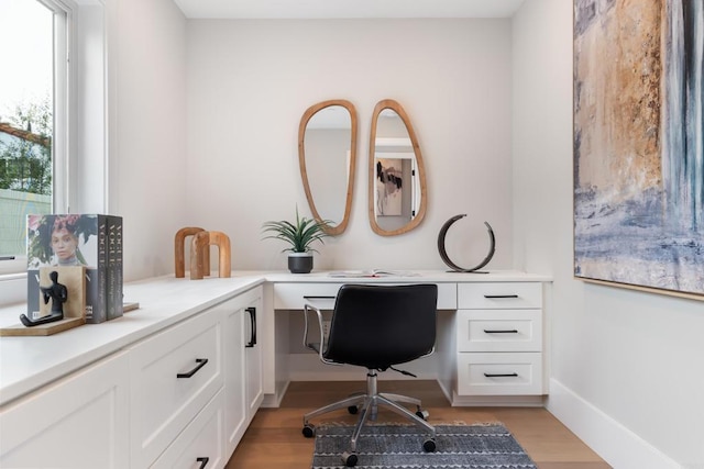 3586 Garfield St, Carlsbad, CA 92008 - office area with built in study area and light wood-style floors