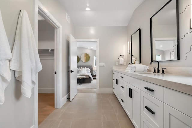 3586 Garfield St, Carlsbad, CA 92008 - ensuite bathroom with vanity, a walk in closet, and recessed lighting