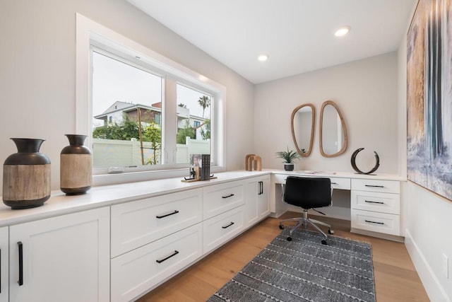 3586 Garfield St, Carlsbad, CA 92008 - office area with built in study area, light wood finished floors, and recessed lighting