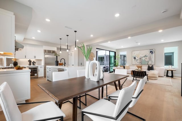 3586 Garfield St, Carlsbad, CA 92008 - dining space featuring beverage cooler, recessed lighting, and light wood finished floors