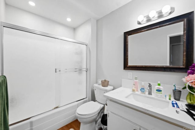 6354 Rancho Mission Rd Unit 517, San Diego, CA 92108 - full bathroom featuring vanity, combined bath / shower with glass door, wood finished floors, and recessed lighting