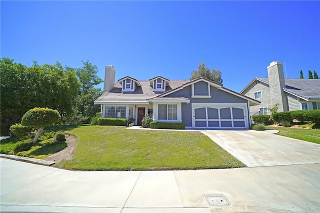 20004 Kent Ln, Canyon Country, CA 91351 - view of front of house featuring driveway, a front yard, an attached garage, and a chimney