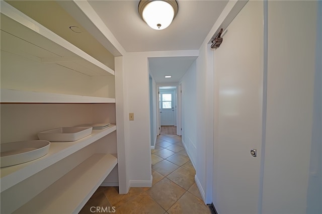20004 Kent Ln, Canyon Country, CA 91351 - corridor featuring light tile patterned flooring and baseboards