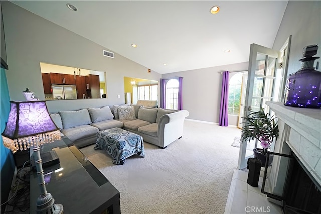 27768 Crookshank Dr, Saugus, CA 91350 - living area featuring light colored carpet, high vaulted ceiling, recessed lighting, and a high end fireplace