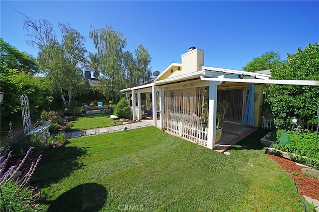 27768 Crookshank Dr, Saugus, CA 91350 - view of grassy yard with a patio area