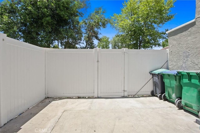 22983 Via Cereza Unit 3B, Mission Viejo, CA 92691 - view of patio with a gate