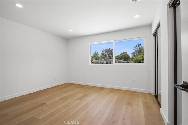 22983 Via Cereza Unit 3B, Mission Viejo, CA 92691 - unfurnished room with light wood finished floors and recessed lighting