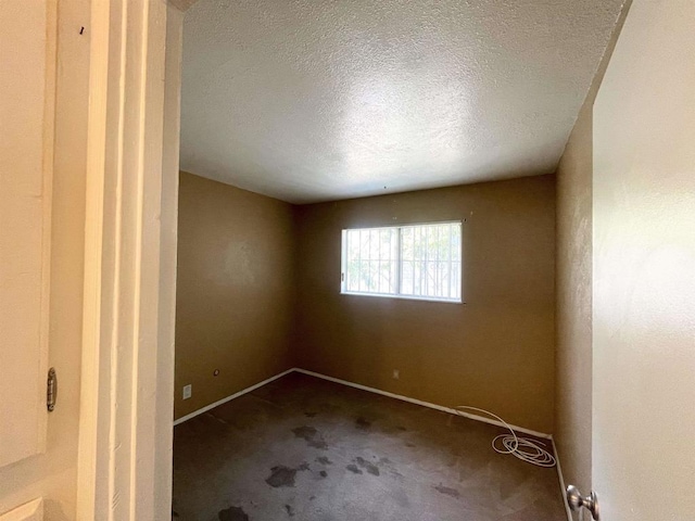 1195 Ilexey Ave, San Diego, CA 92154 - empty room with carpet flooring and a textured ceiling