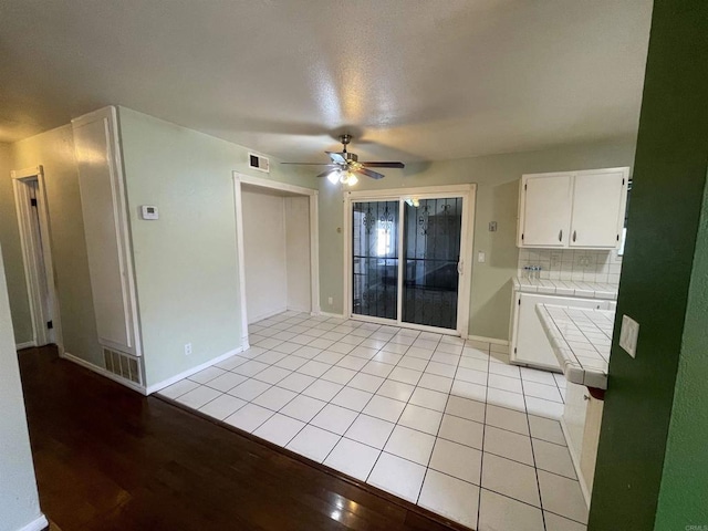 1195 Ilexey Ave, San Diego, CA 92154 - unfurnished dining area with ceiling fan and light wood-type flooring