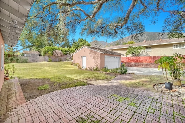 1801 Wilson Ave, Arcadia, CA 91006 - view of patio with an outbuilding, a garage, and driveway