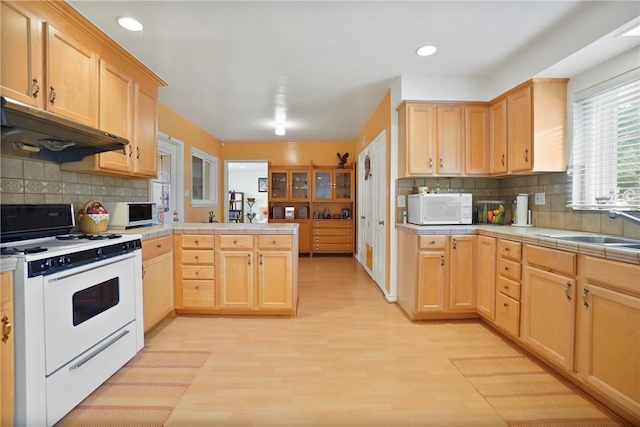 1801 Wilson Ave, Arcadia, CA 91006 - kitchen with white appliances, under cabinet range hood, light brown cabinets, and recessed lighting